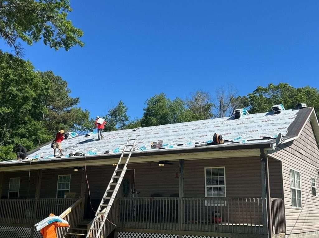 Is it safe to tarp your own roof? Safety tips & when to call a pro