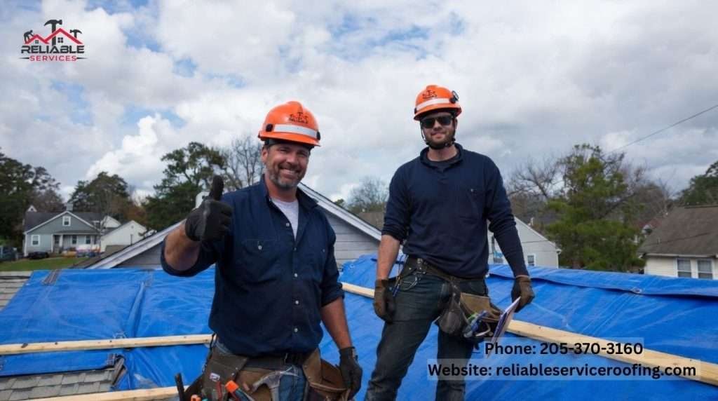 Reliable Service Roofing team after emergency temporary roof tarp installation in Birmingham AL
