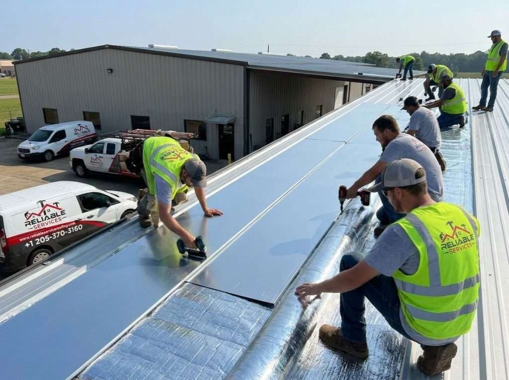 Metal roofing installation by expert roofing contractors on a commercial building in Houston, TX – GAF certified roofing contractors